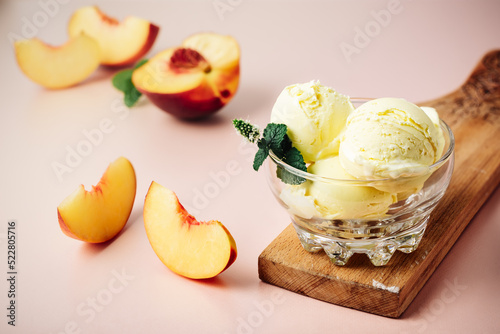 Scoop of peach ice cream.