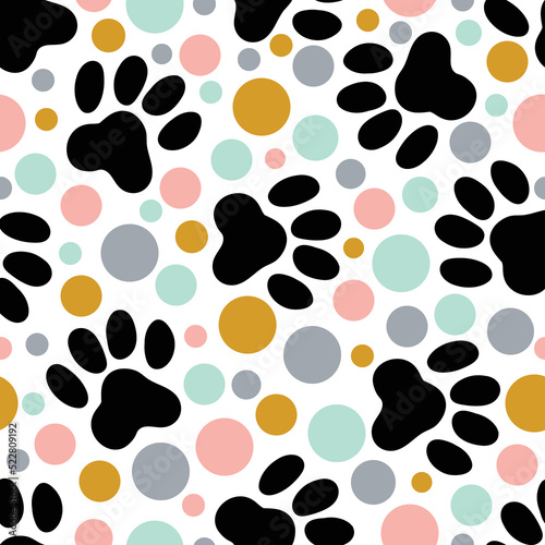 Paw prints. Funny children's seamless pattern. Can be used in textile industry, paper, background, scrapbooking.Vector.