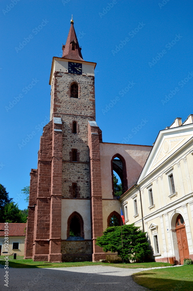 The unfinished Gothic church of St. Procopius and the Baroque Prelature