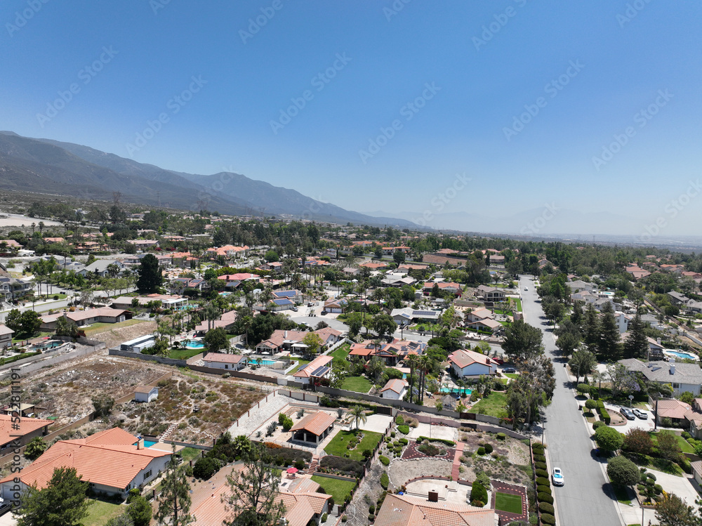 Aerial view of wealthy Alta Loma community and mountain range, Rancho Cucamonga, California, United States