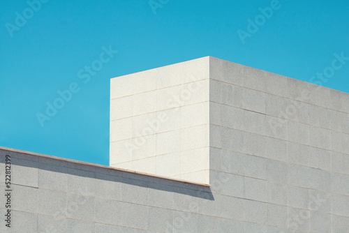 Urban architeture. Close up of a modern building with sky.