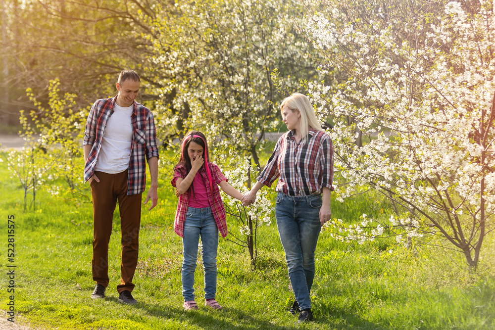 Fototapeta premium the little girl cries, strict parents