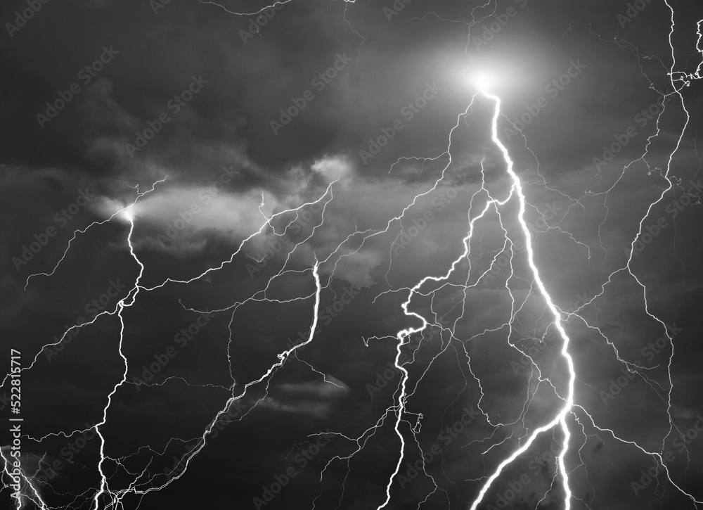 Fork lightning striking down during summer storm