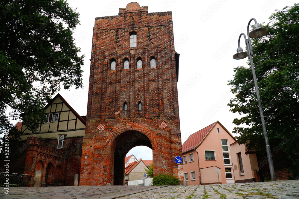 Fototapeta premium The city gate Neupervertor, old medieval city fortifications of the Small town Salzwedel, Altmark county, Saxony Anhalt state, Germany.