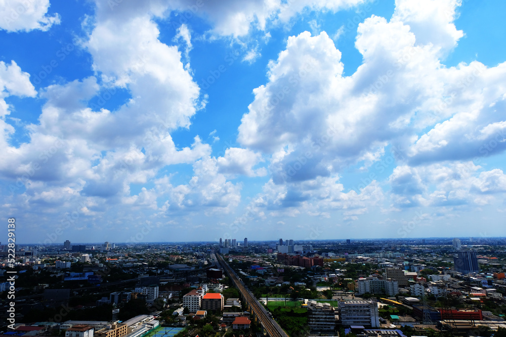Blue sky and white cloud on a sunny day at City view - skyscape & Cloudscape in Thailand Blue sky and white cloud on a sunny day at City view - skyscape & Cloudscape in Thailand