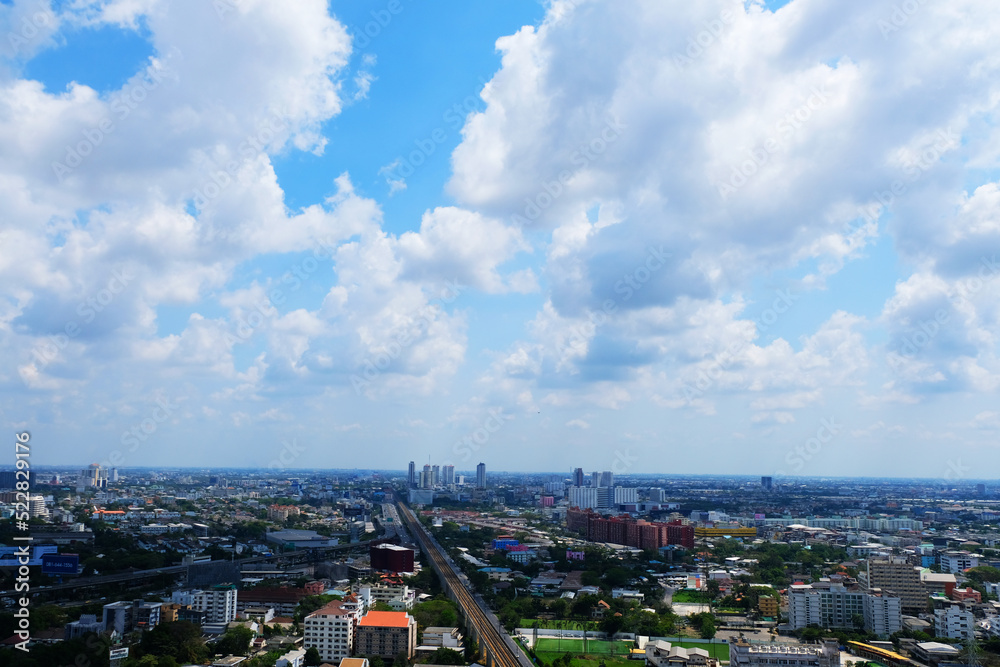 Blue sky and white cloud on a sunny day at City view - skyscape & Cloudscape in Thailand