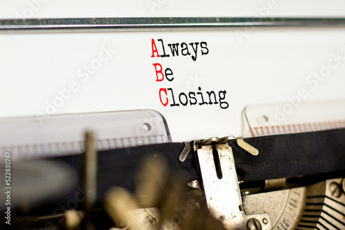 ABC always be closing symbol. Concept words ABC always be closing typed on the old retro typewriter on a beautiful white background. Business and ABC always be closing concept. Copy space. photo