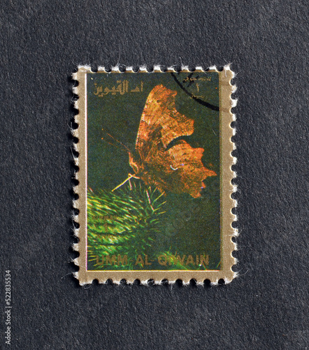 Umm al-Qiwain - circa 1972 : Cancelled postage stamp printed by Umm al-Qiwain, that shows Butterfly, circa 1972.