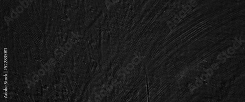 Charcoal black concrete wall for background. Dark black cement Scary black stone wall