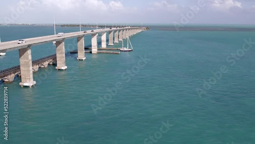 Wallpaper Mural Aerial Forward Slow Motion Shot Of Vehicles On Seven Mile Bridge Over Sea Against Cloudy Sky -  Florida Keys, Florida Torontodigital.ca