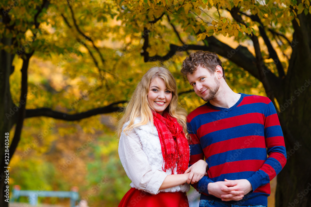Couple in love enjoy romantic date in park. Couple in love enjoy romantic date in park.