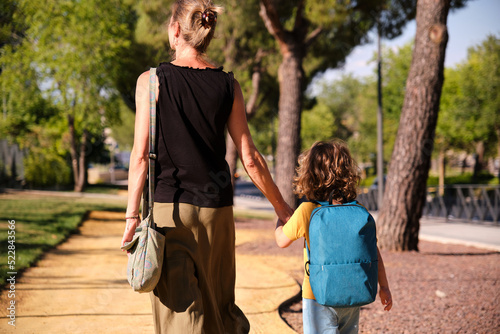 A Mother and Son Walking Home from School