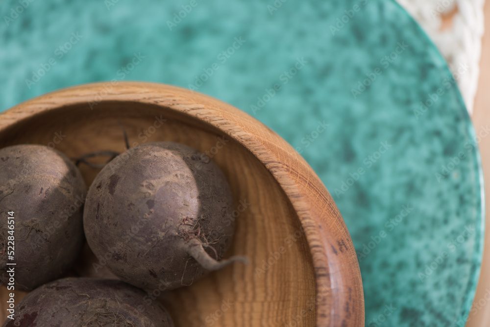 wooden bowl with beets, close-up of a wooden bowl