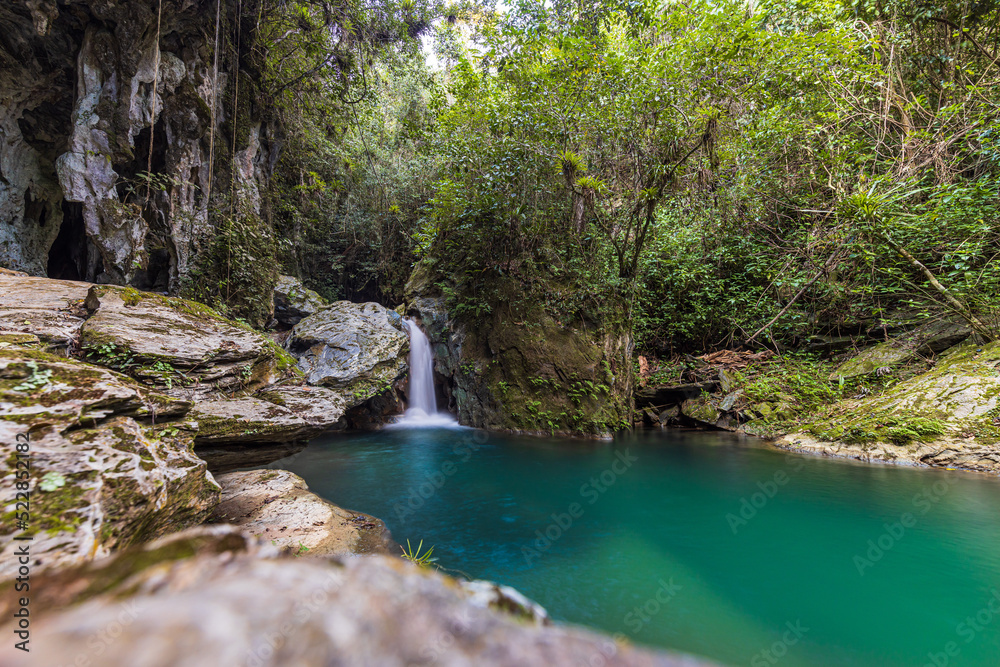 Guanayara, Cuba - January 6, 2021: Waterfalls at Gruta Nengoa at Guanayara National Park Cuba