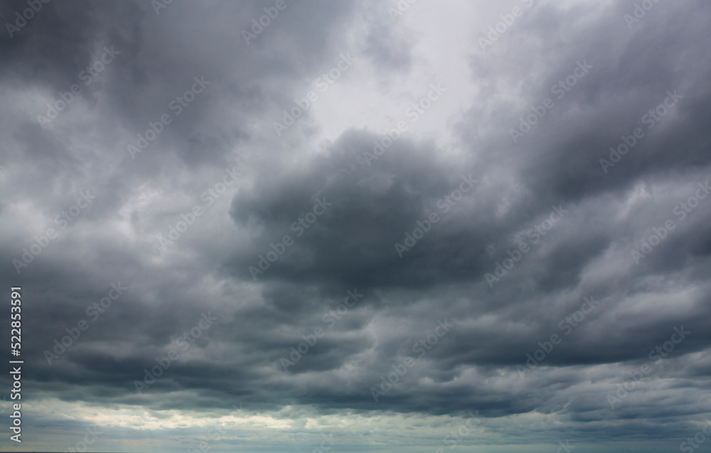 Background of gloomy sky and dark black clouds. surface texture stormy sky Background of gloomy sky and dark black clouds. surface texture stormy sky