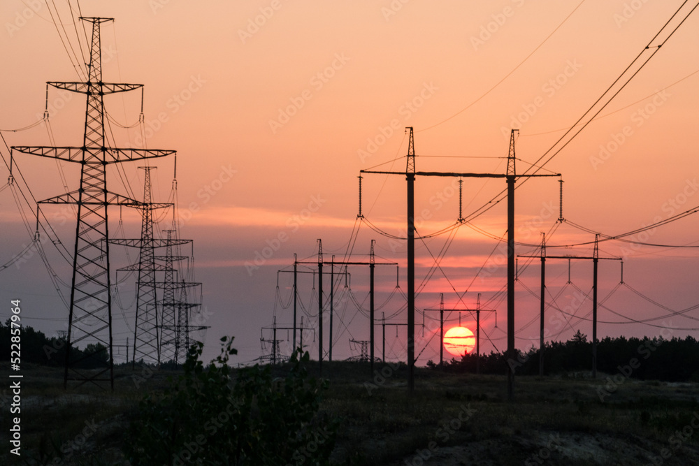 Sunset against the background of power lines in Energodar