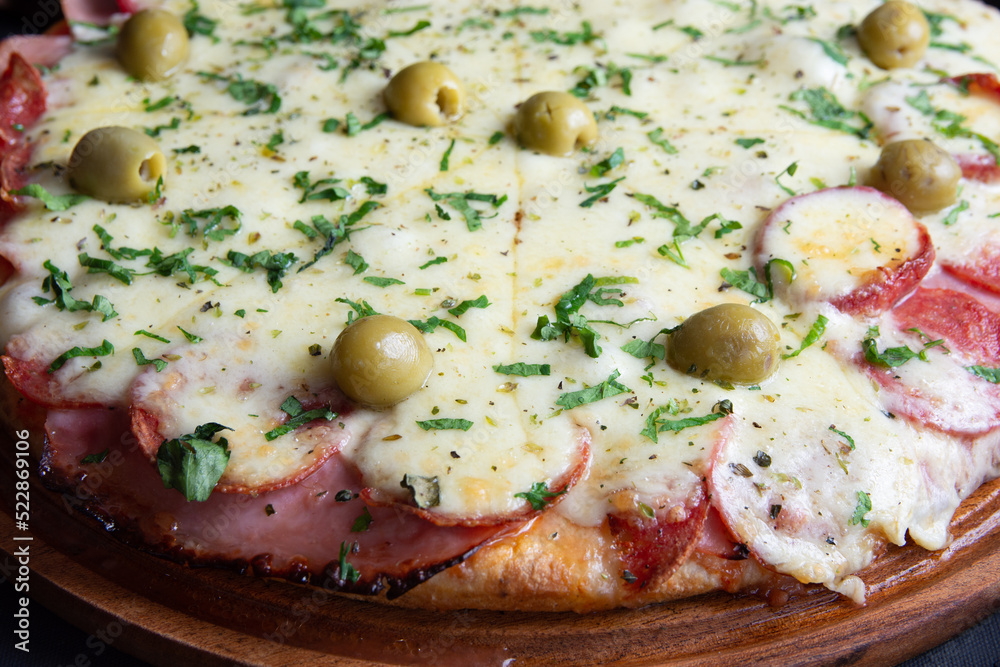 pizza con rodajas de salame y queso Stock Photo Adobe Stock