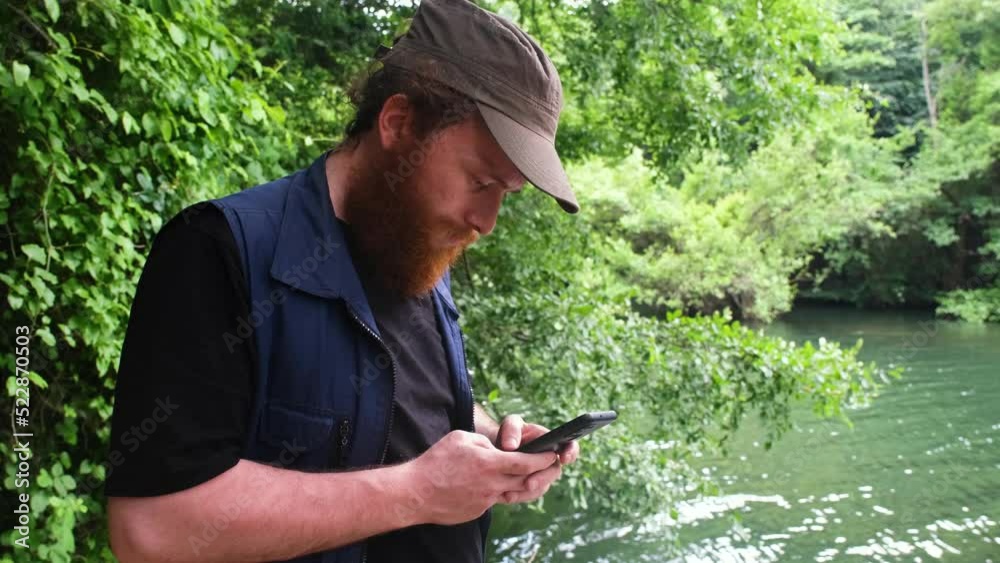 man texting phone