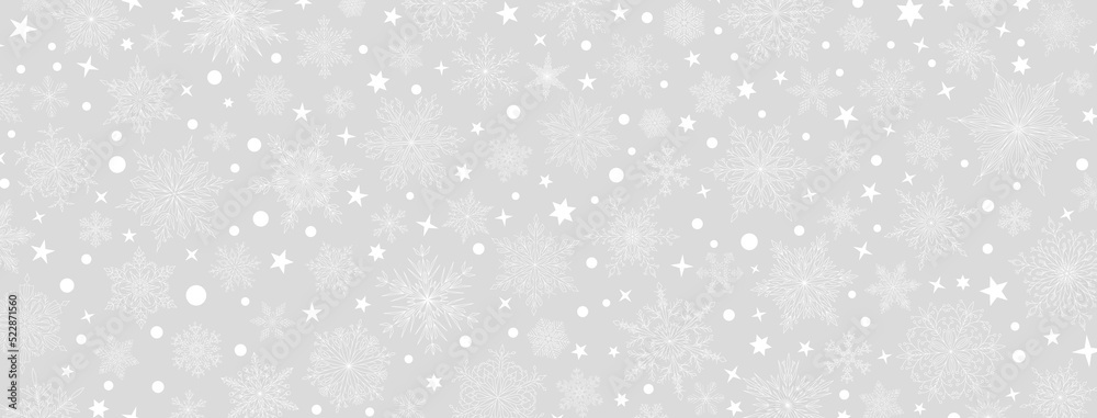 Background of complex big and small Christmas snowflakes in gray colors. Winter illustration with falling snow