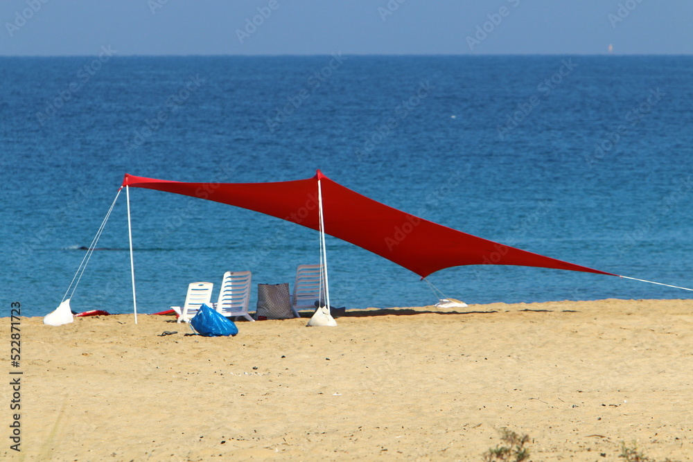 Tourist tent on the Mediterranean coast. Tourist tent on the Mediterranean coast.