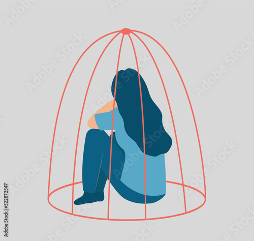 Sad woman locked inside a cage. Influence of drug addiction on mental health. Prisoner girl suffers from Inequality. Concept of restrictions on human rights or freedoms in society. Women's empowerment