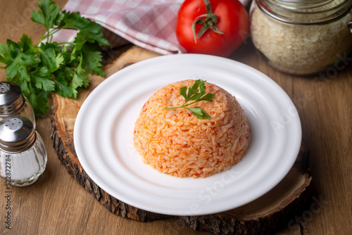 Traditional delicious Turkish food; rice pilaf with tomatoes (Turkish name; Domatesli pirinc pilavi)