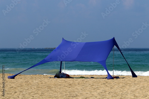 Tourist tent on the Mediterranean coast.