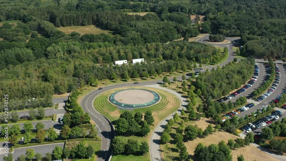 4K Aerial drone video for beautiful architecture in middle of the country side, technology cars and go green