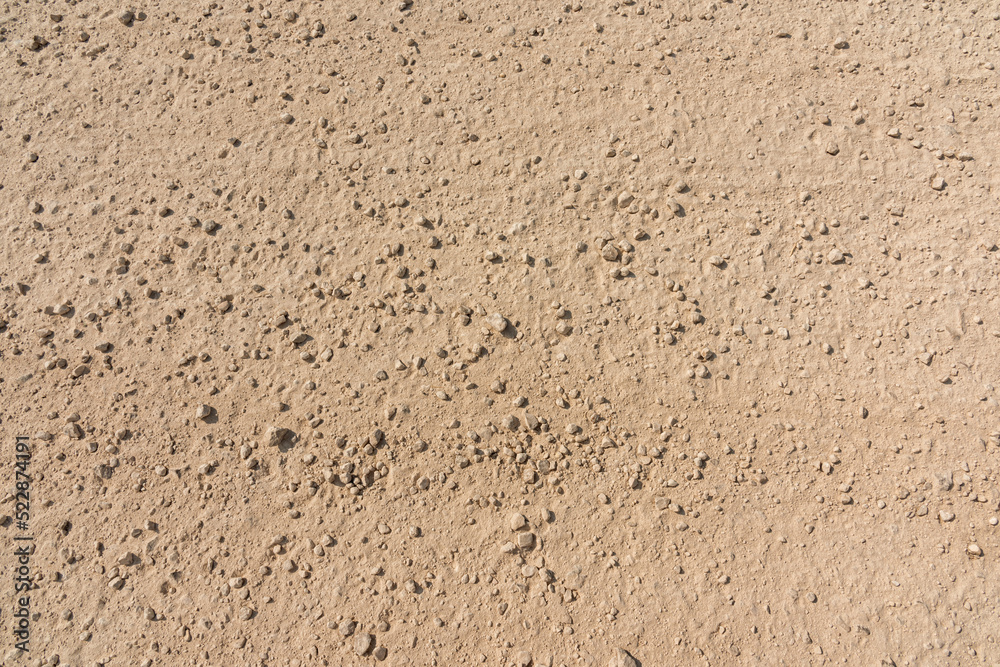 Road underfoot, sand and gravel, top view Road underfoot, sand and gravel, top view