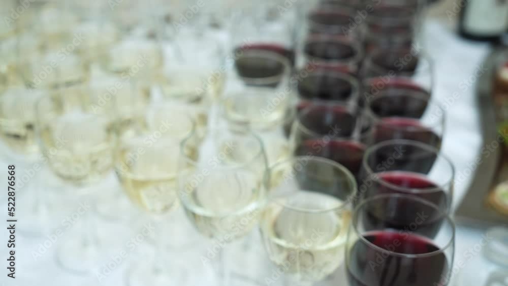 Wine. Row of wine glasses with poured alcohol at party banquet. close-up. Wine. Row of wine glasses with poured alcohol at party banquet. close-up.