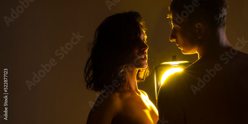 silhouette of a couple. Kissing couple. Man and woman posing. Beauty. Lovely. Romantic. 