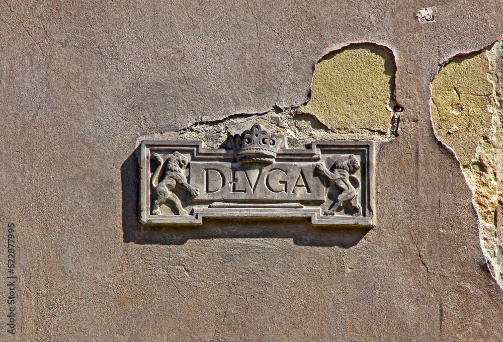 Vintage street sign (Dluga street) in the Gdansk Old Town, Poland