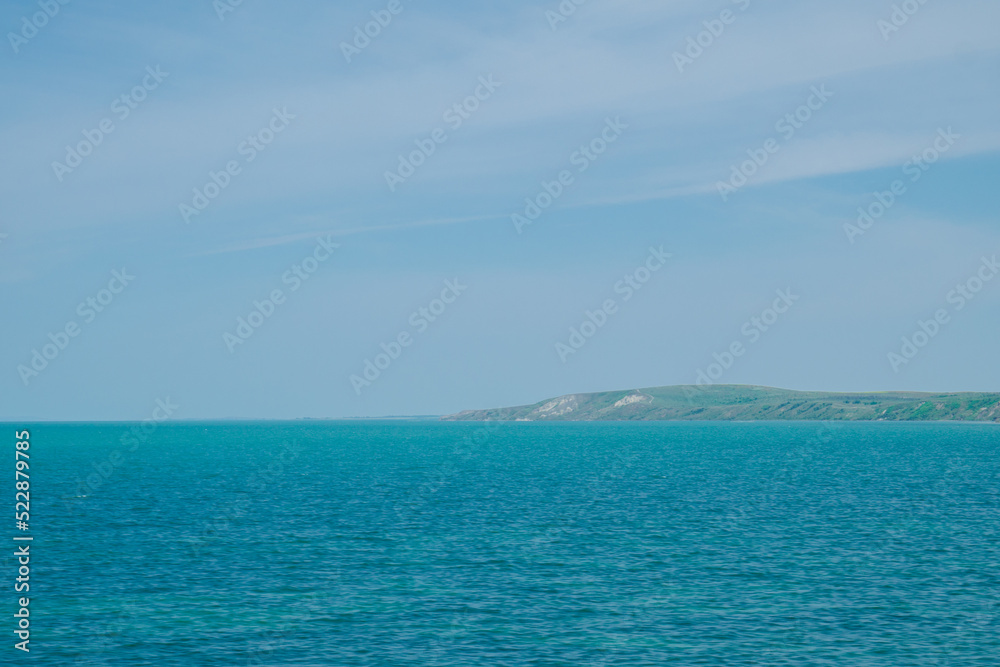 Summer panoramic view of the sea and mountain range. High quality photo