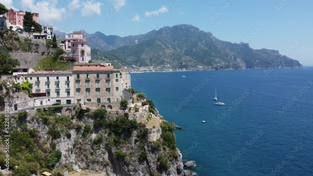 Flying over Amalfi, streets, buildings and mediterranean sea filmed by drone in 4k Flying over Amalfi, streets, buildings and mediterranean sea filmed by drone in 4k