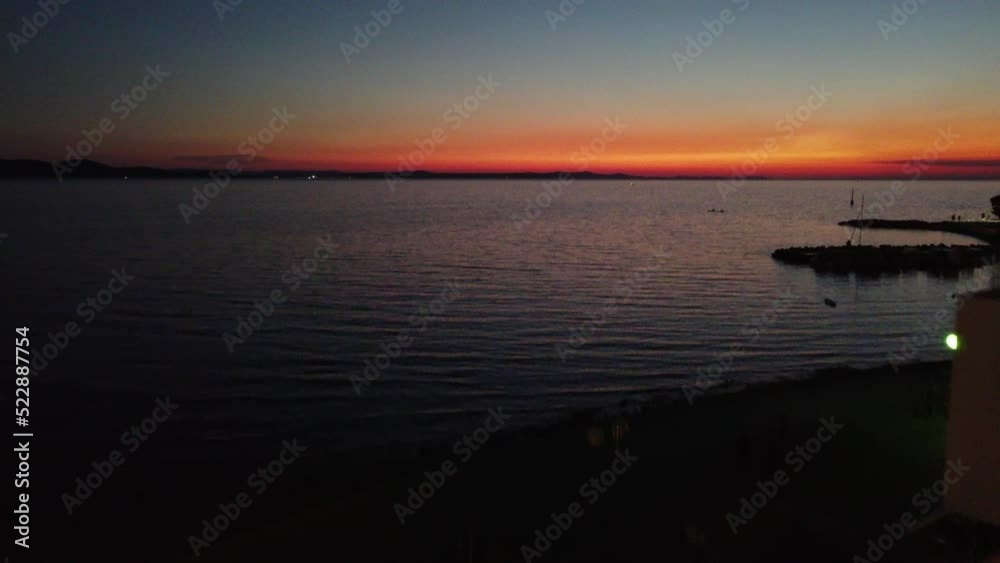 Beautiful sunset in Croatia watched from a luxury villa with a swimming pool Beautiful sunset in Croatia watched from a luxury villa with a swimming pool