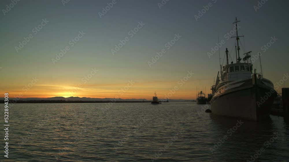 Tugboat Returning Fraser River Sunset BC 4K UHD. A tug boat returns to Steveston Harbor on the Fraser River in British Columbia, Canada at sunset. 4K. UHD.
Tugboat Returning Fraser River Sunset BC 4K UHD. A tug boat returns to Steveston Harbor on the Fraser River in British Columbia, Canada at sunset. 4K. UHD.