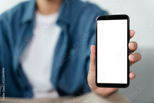 Man hand holding blank empty white screen smart phone.