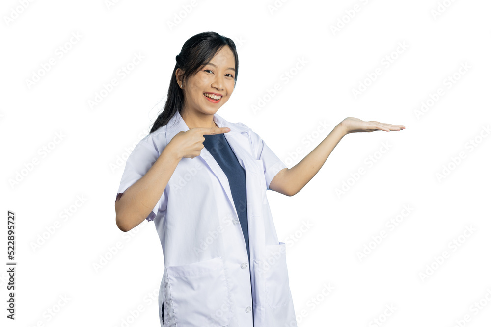 Portrait of young Asian beautiful nurse in white uniform with big smiled show hand to present your product or text on copy space blue background. Portrait of young Asian beautiful nurse in white uniform with big smiled show hand to present your product or text on copy space blue background.