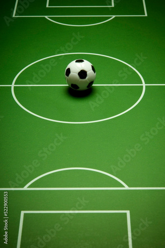 miniature soccer ball on the table soccer board © Visualmind