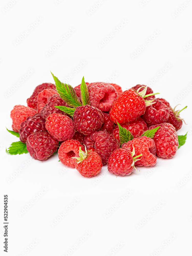 Ripe raspberries with leaf isolated on a white background Ripe raspberries with leaf isolated on a white background