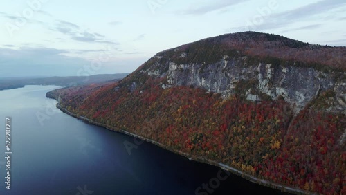 View Of Rugged Mount Pisgah With Autumn Foliage And Lake Willoughby In Westmore Town In Vermont, USA. aerial drone photo