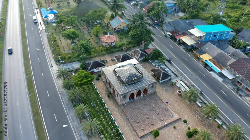 4k aerial view of Kresek mosque in Pattani,Thailand, old architecture design building from red brick clay, history landmark in islam religion at south east asia, architecture primitive for muslim pray 4k aerial view of Kresek mosque in Pattani,Thailand, old architecture design building from red brick clay, history landmark in islam religion at south east asia, architecture primitive for muslim pray
