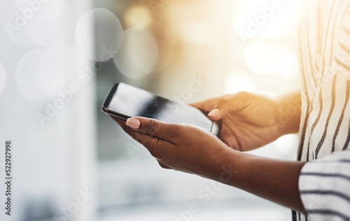 Closeup of female hands chatting or typing a text message to a friend on social media on a phone. Woman reading and replying to a work email. A lady playing a mobile game online