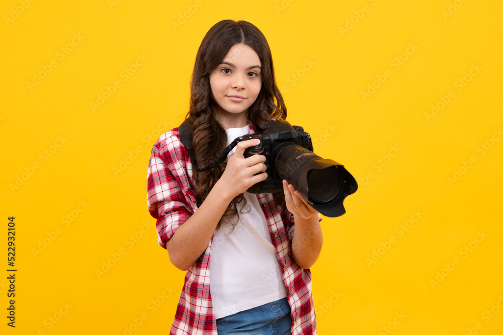 Obraz premium Hobby or career for photographer beginner. Teenage girl with modern camera making video and photo. Kid use digital camera, photographing.