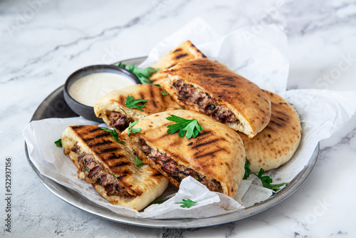Arayes- pita bread filled with a mixture of minced meat with different spices	
 photo