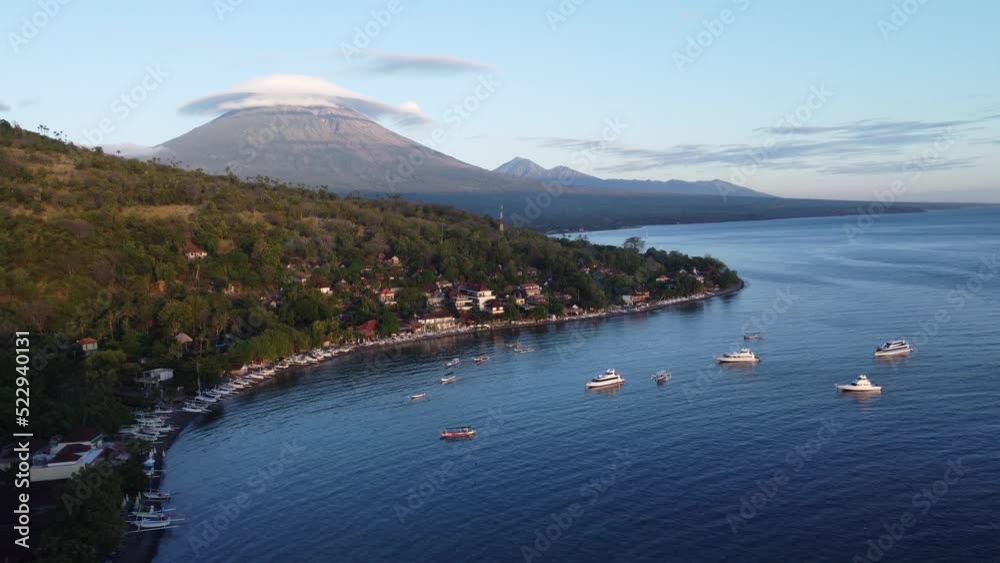 Aerial Drone Lenticular Clouds Morning Sunrise on Mount Agung Volcano and Jemeluk Bay Amed Beach Karangasem East Bali Indonesia Aerial Drone Lenticular Clouds Morning Sunrise on Mount Agung Volcano and Jemeluk Bay Amed Beach Karangasem East Bali Indonesia