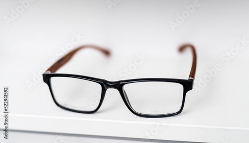 Stylish modern eyesight glasses. Eyewear accessory in white background.