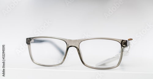 Eyewear accessory in white background. Stylish modern eyesight glasses.