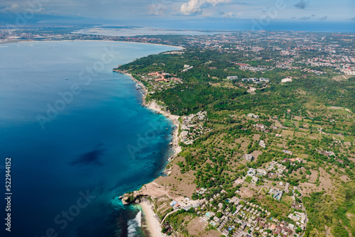View on Bukit, Jimbaran and blue ocean in Bali. Aerial view of Bali island photo