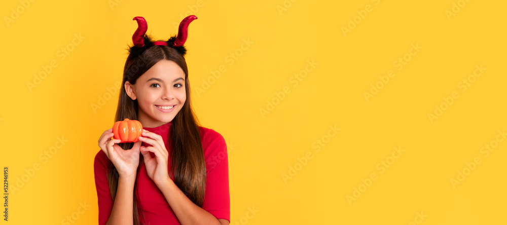 trick or treat. teen girl on yellow background. celebrate autumn party holiday. Halloween kid girl portrait, horizontal poster. Banner header with copy space. trick or treat. teen girl on yellow background. celebrate autumn party holiday. Halloween kid girl portrait, horizontal poster. Banner header with copy space.